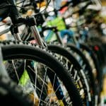 A close up of bicycle wheels.