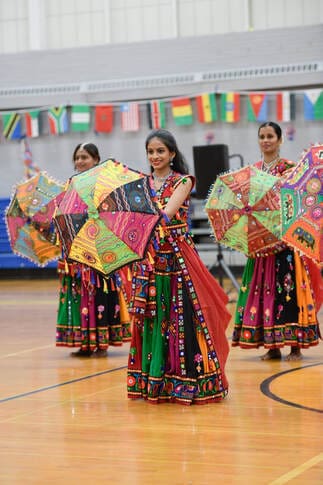 People of different cultures dancing